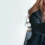 Businesswoman handshake and business people. Successful business concept. Banner background, panoramic view.